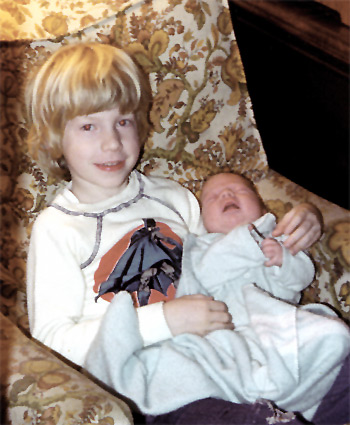 Me holding my little brother. He